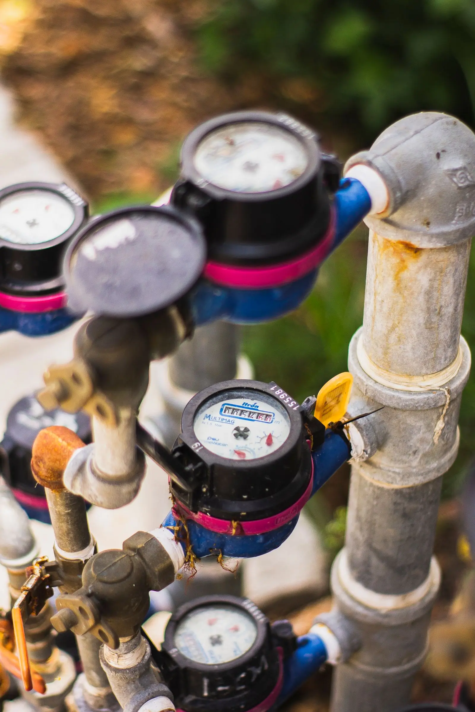 Residential water meters on a supply pipe